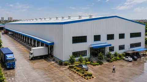 PEB warehouse with loading dock and truck